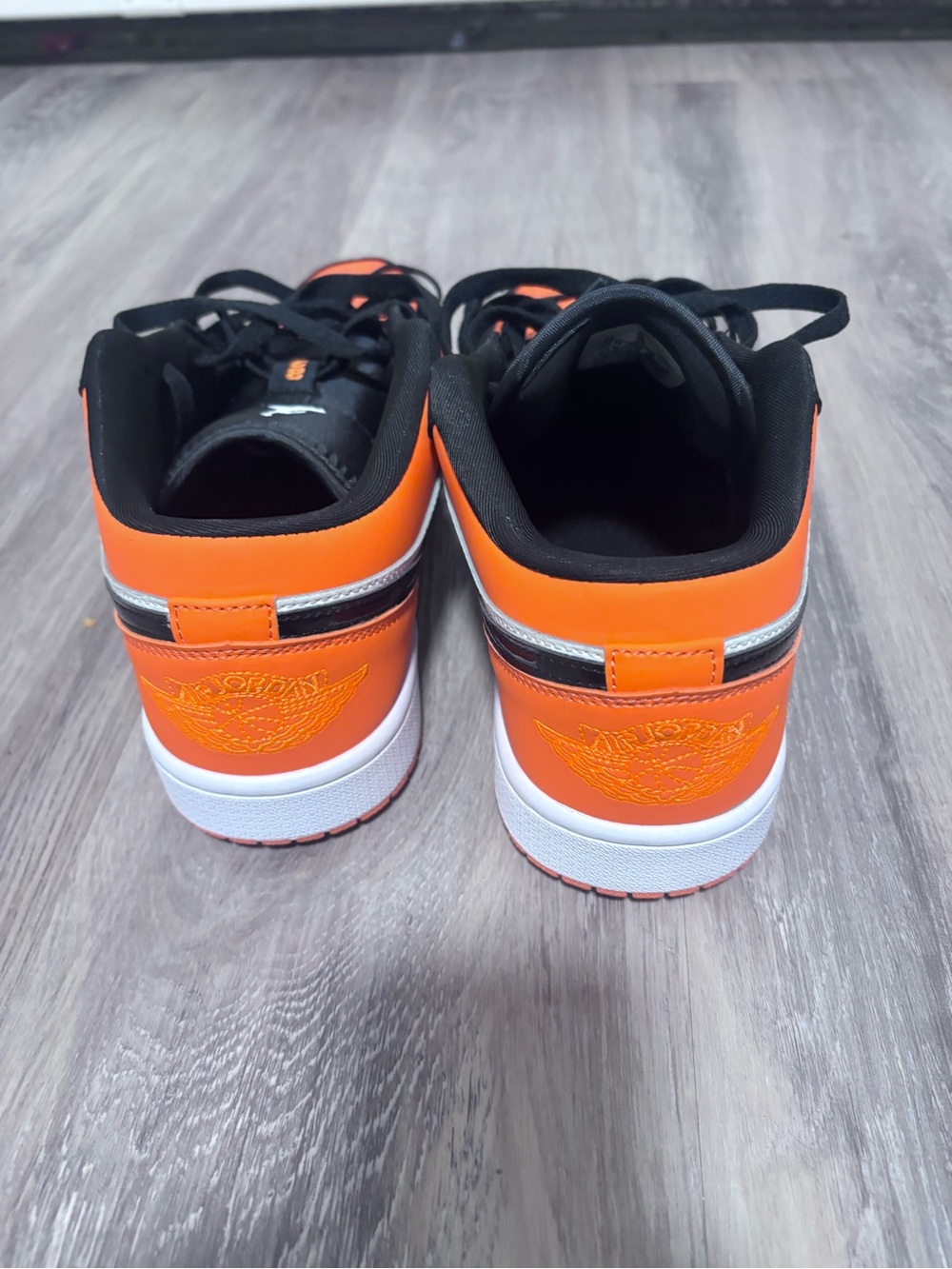 Jordan Orange and Black Low Top Sneakers with White Sole